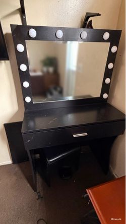 Black vanity with lights