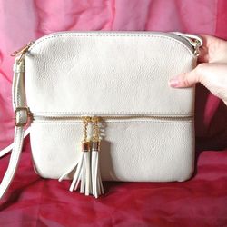 Crossbody Bag with Tassels Cream Beige.

Faux Leather Cream Beige Bag With Two tassels