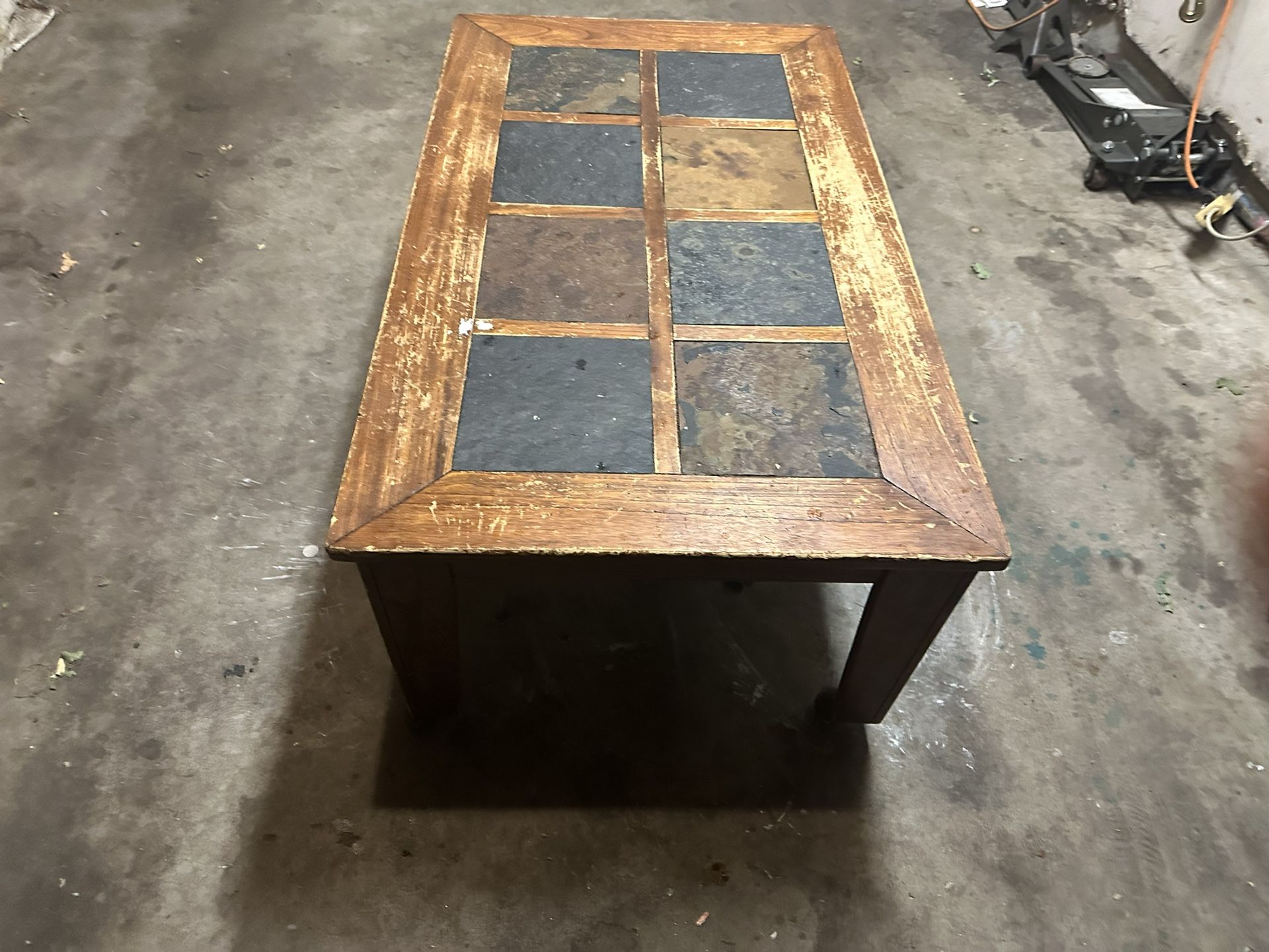 Worn Rolling Coffee Table With Stone Square Design
