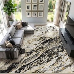 10x12 black, cream, and gold abstract marble area rug