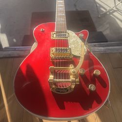 Gretsch Electromatic Pro Jet electric guitar, likely a G5431G model or similar in a vibrant red finish