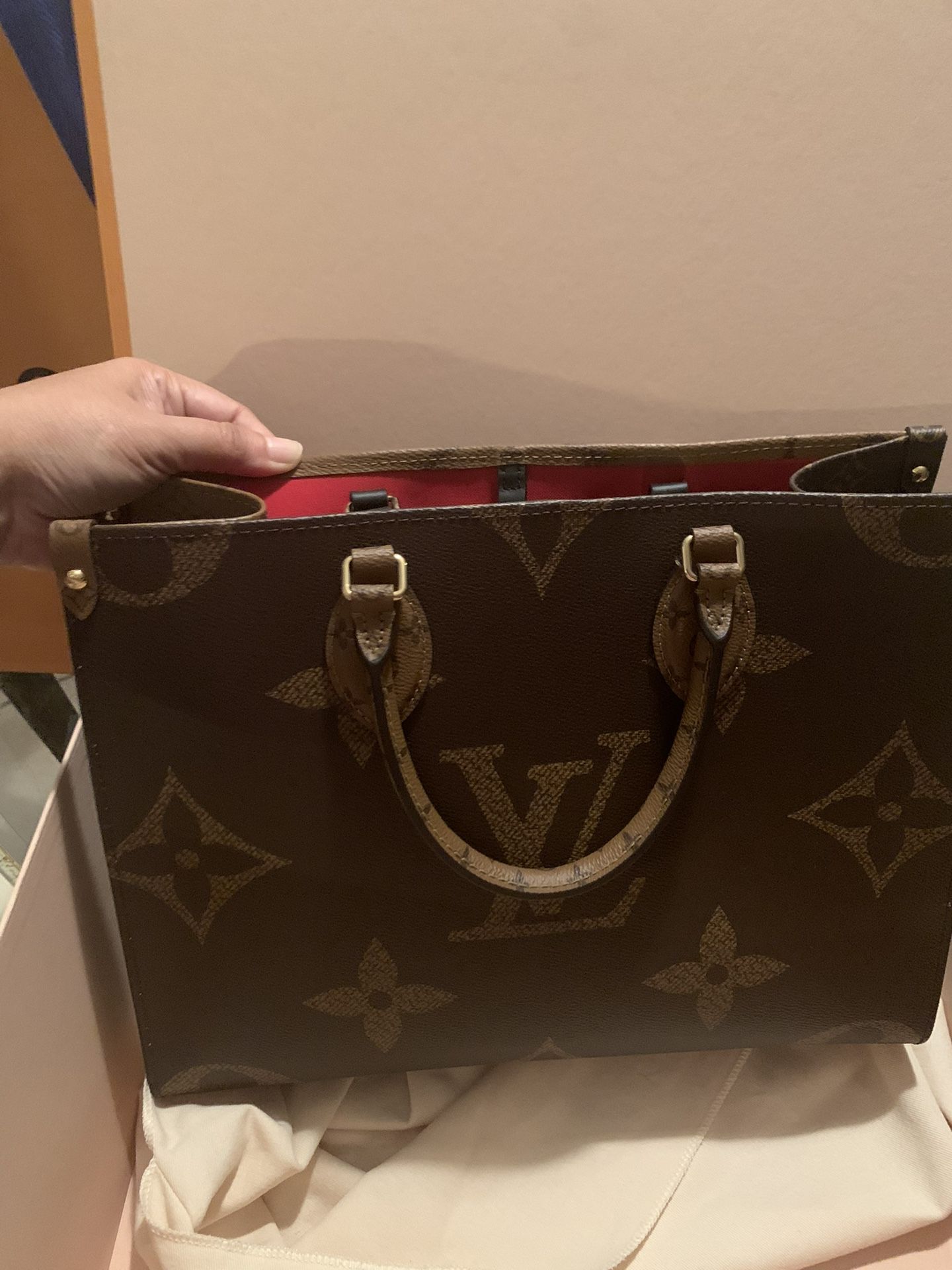Limited Edition Louis Vuitton Floral Design on Black Signature Logo LV  Embossed OnTheGo Tote Bag for Sale in Wellington, FL - OfferUp