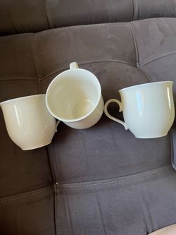 Cream ceramic mugs