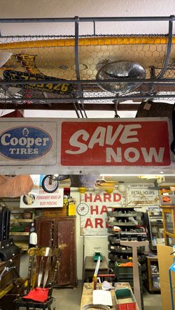 Antique metal Cooper Tire sign