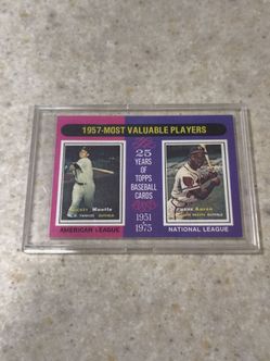 1975 Topps Mickey Mantle/Hank Aaron baseball card.