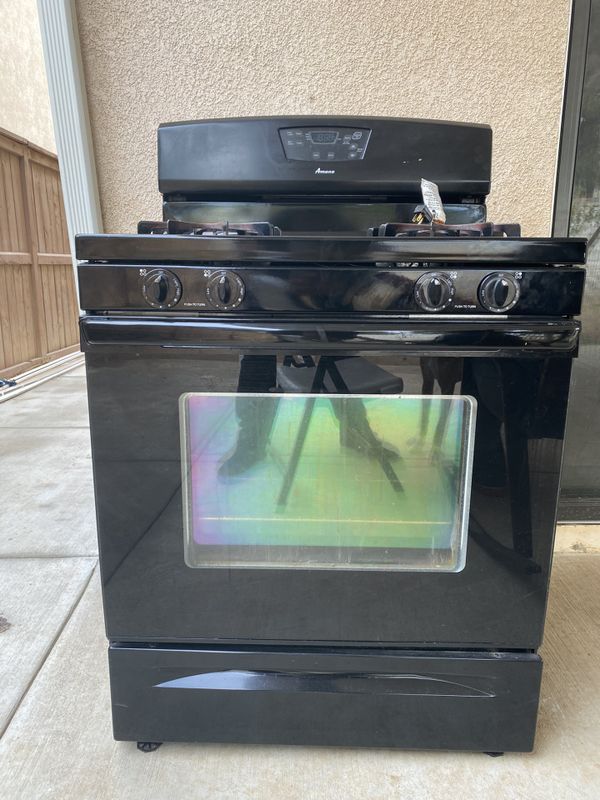 amana stove f2