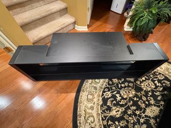 Black TV stand w/glass shelf