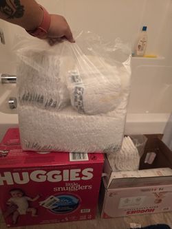 3 Packs Of Diapers Size 2 $90 Obo