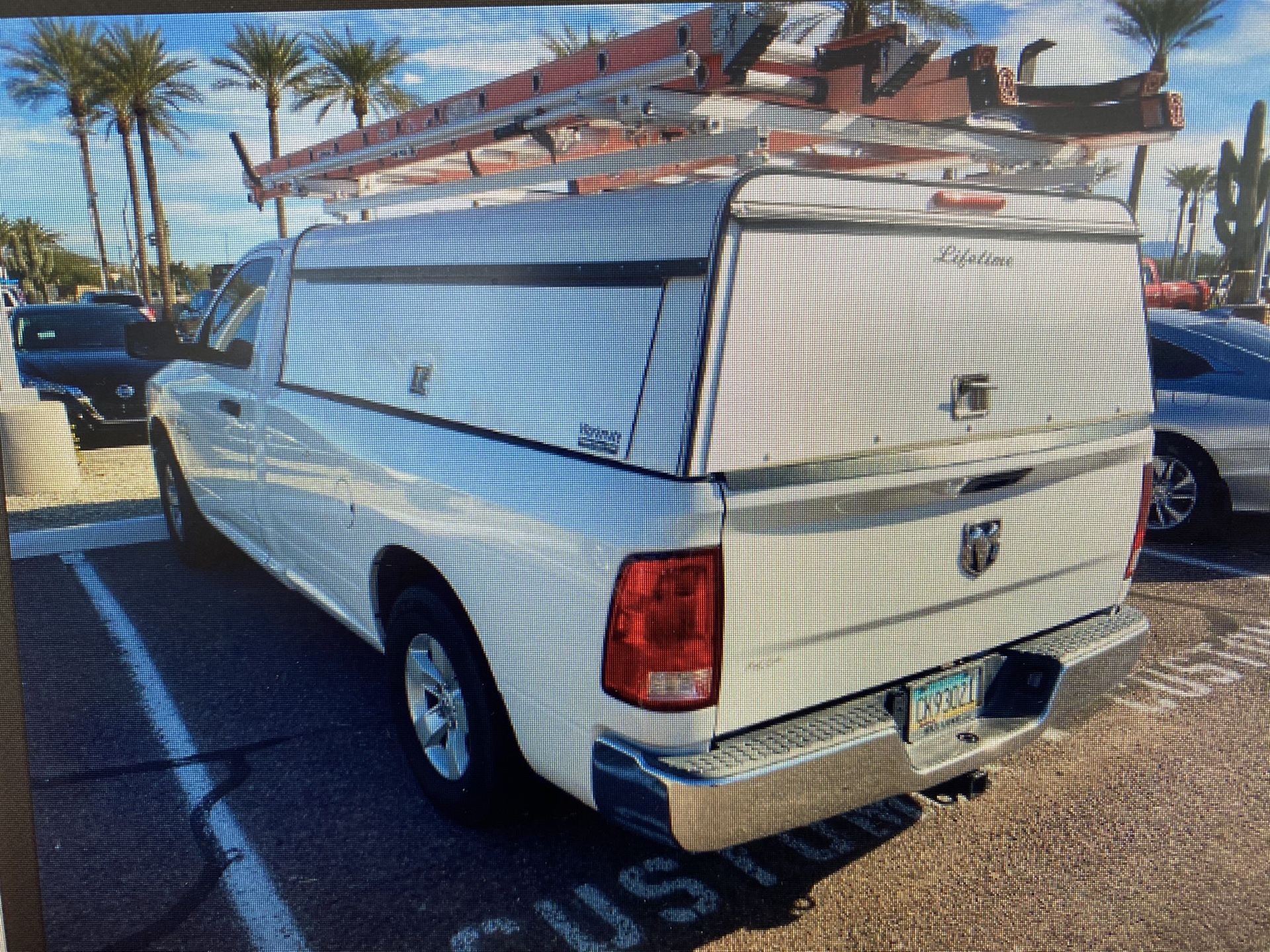 Utility top truck top camper shell with ladder rack and 2x cabinets