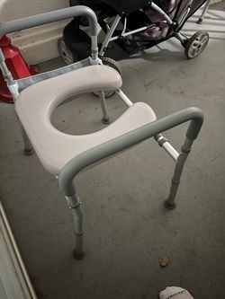 RaisedToliet seat (brand new)