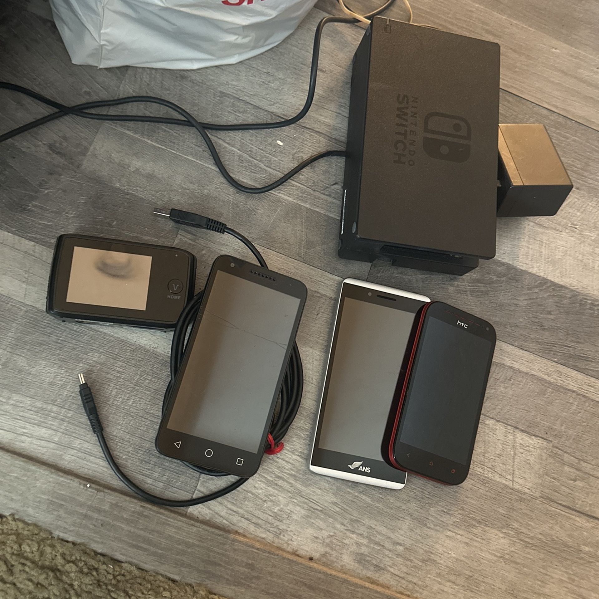 Cameras, Switch, Dock, Phones, And Cord Huge Lot