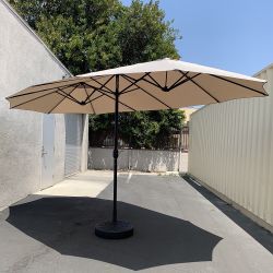 New in Box $130 Large Double Sided Outdoor (15ft Umbrella and 65lbs Plastic Base set) Beige color  