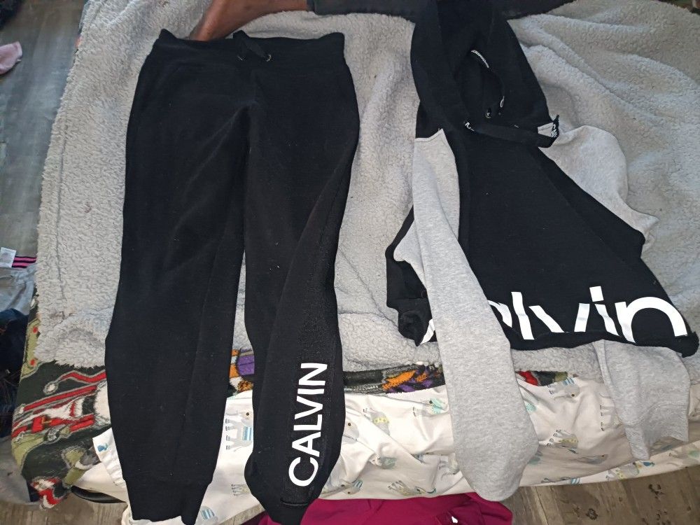 Assorted Joggers And Scrubs And Women's Shoes