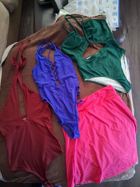 New 2 Bathing suit+ 1 Body Suit + 1 Skirt