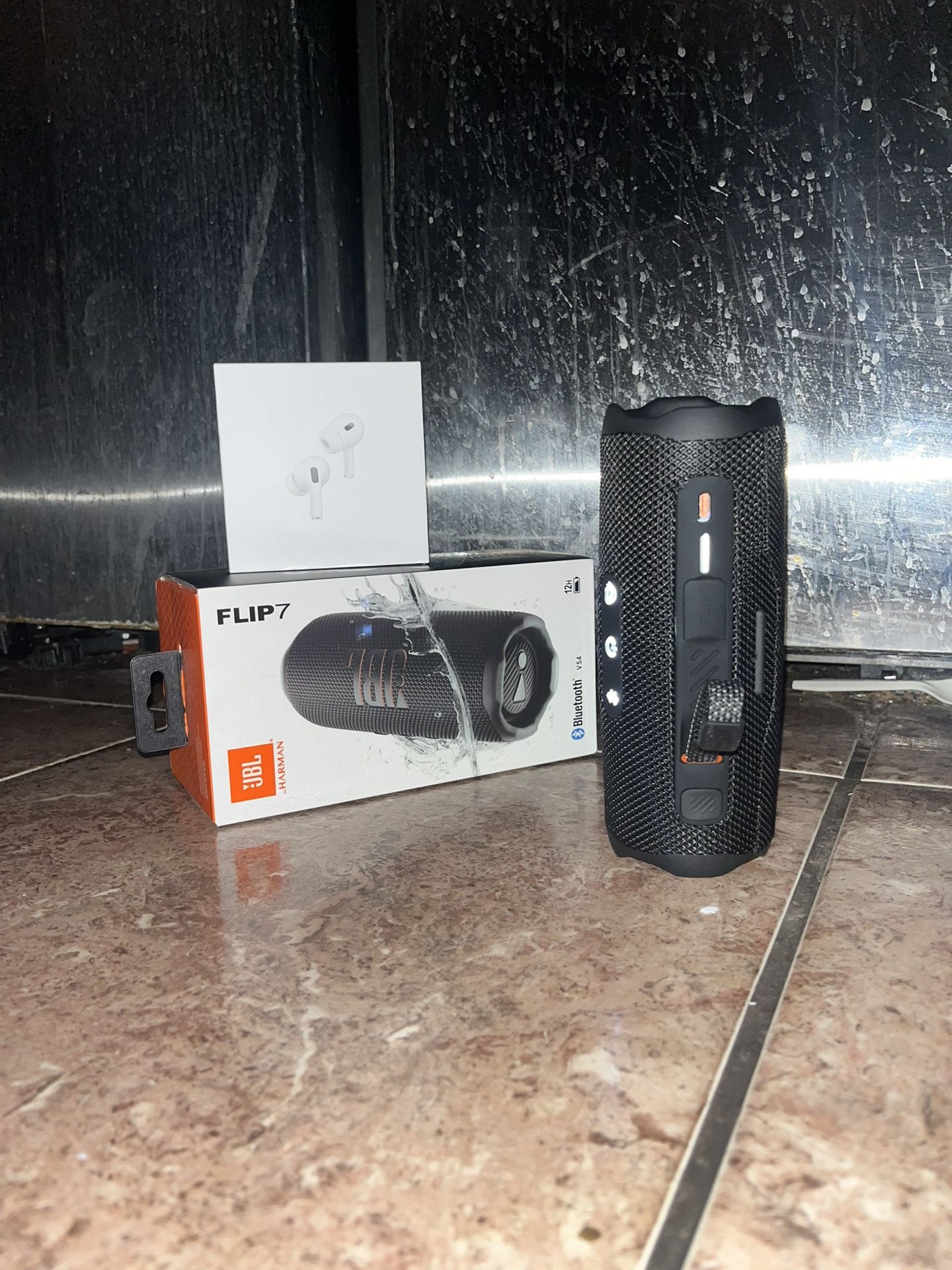 JBL Flip 7 And AirPods