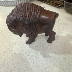 Bison carving ironwood