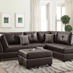 ESPRESSO FAUX LEATHER SECTIONAL WITH REVERSIBLE CHAISE. OTTOMAN INCLUDED 