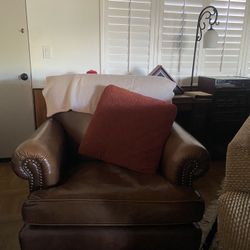 2 extra large comfy quality leather swivel chairs 