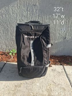 Oakley Suitcase w/ Handle on Wheels