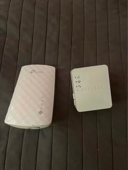 Two Wi-Fi extenders