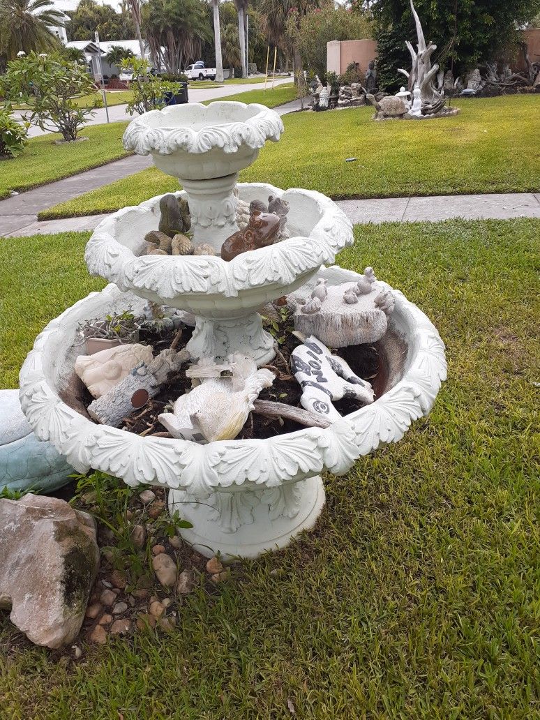 Large 4 and a 1/2 foot tall  3 tiered concrete fountain