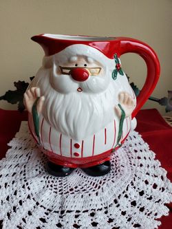Vintage omnibus Santa holding suspenders Pitcher