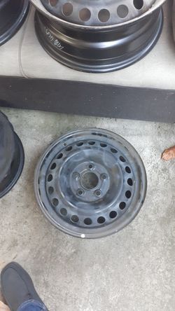 Brand New 4 set 5 lugs black rimss