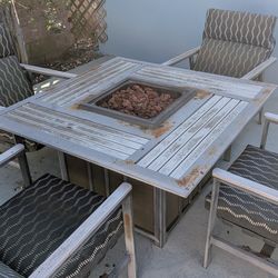 Outdoor patio fire pit table and chairs