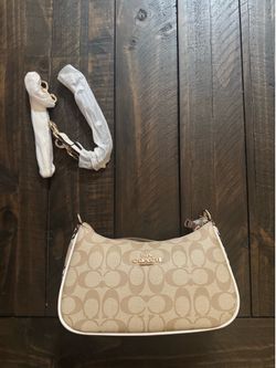 Snake skin coach bag