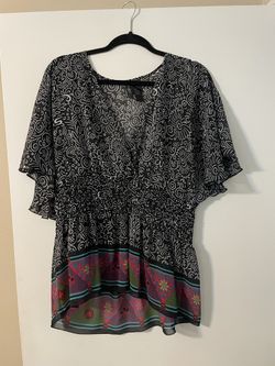 Lady size large tops and tunic five dollars each