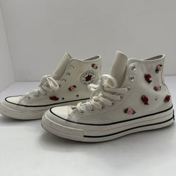 Converse Chuck 70 Valentine's Day High Top shoes in Egret with ribbon rose appliqués. 