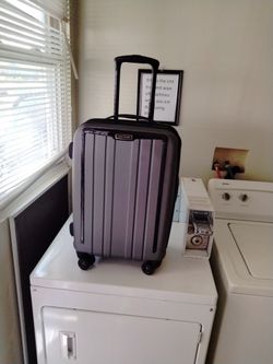 Suitcase On Rollers