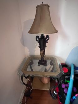 Three Glass Table set and two lamps .