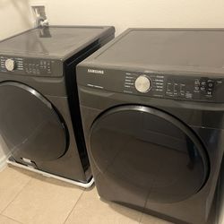 Black Samsung Steam Washer and Multi Steam Dryer 
