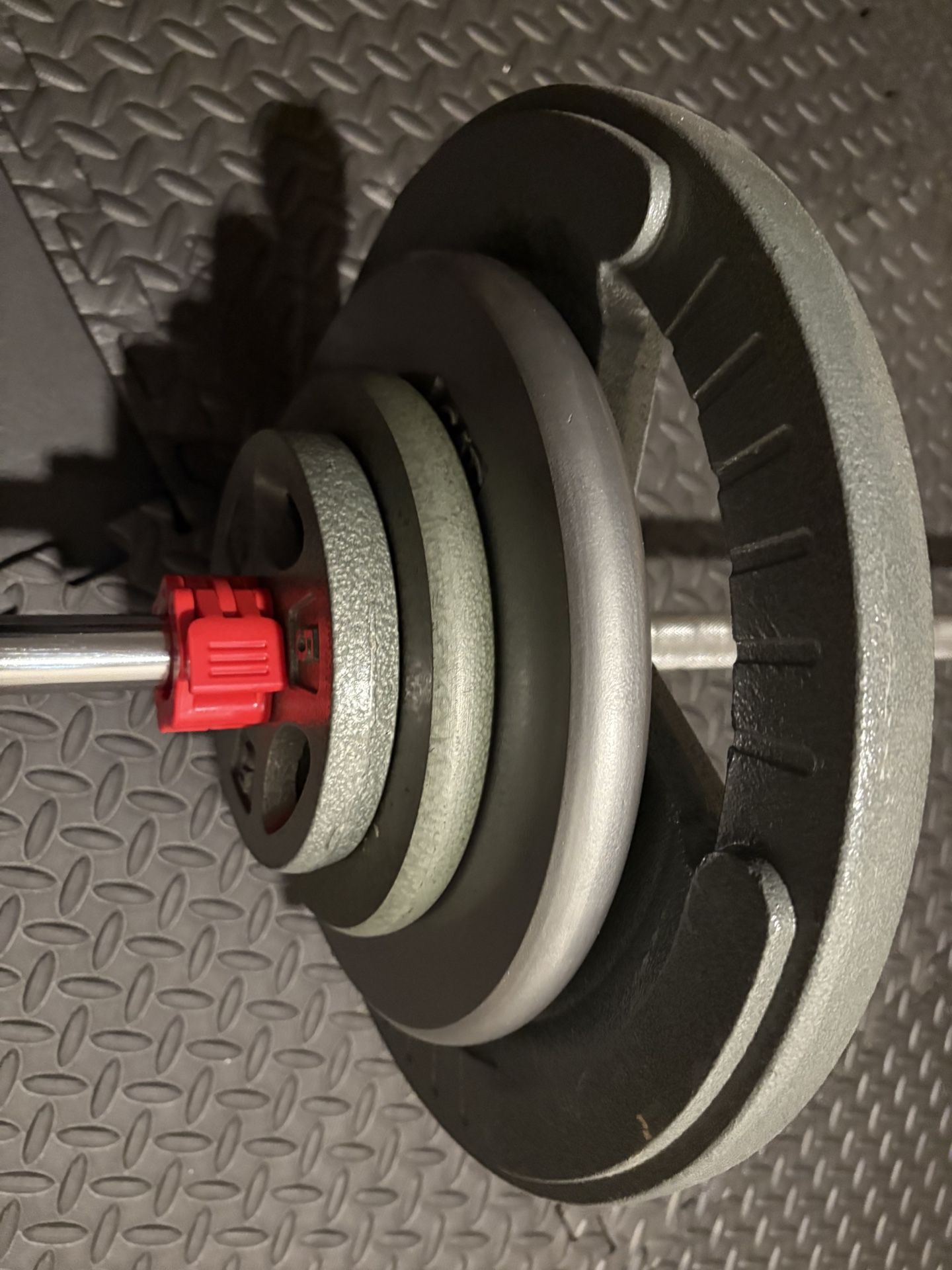 BRAND NEW Standard: 6 ft Steel Barbell with pairs of 45s 25s 10s and 5s. Total: 190 lbs