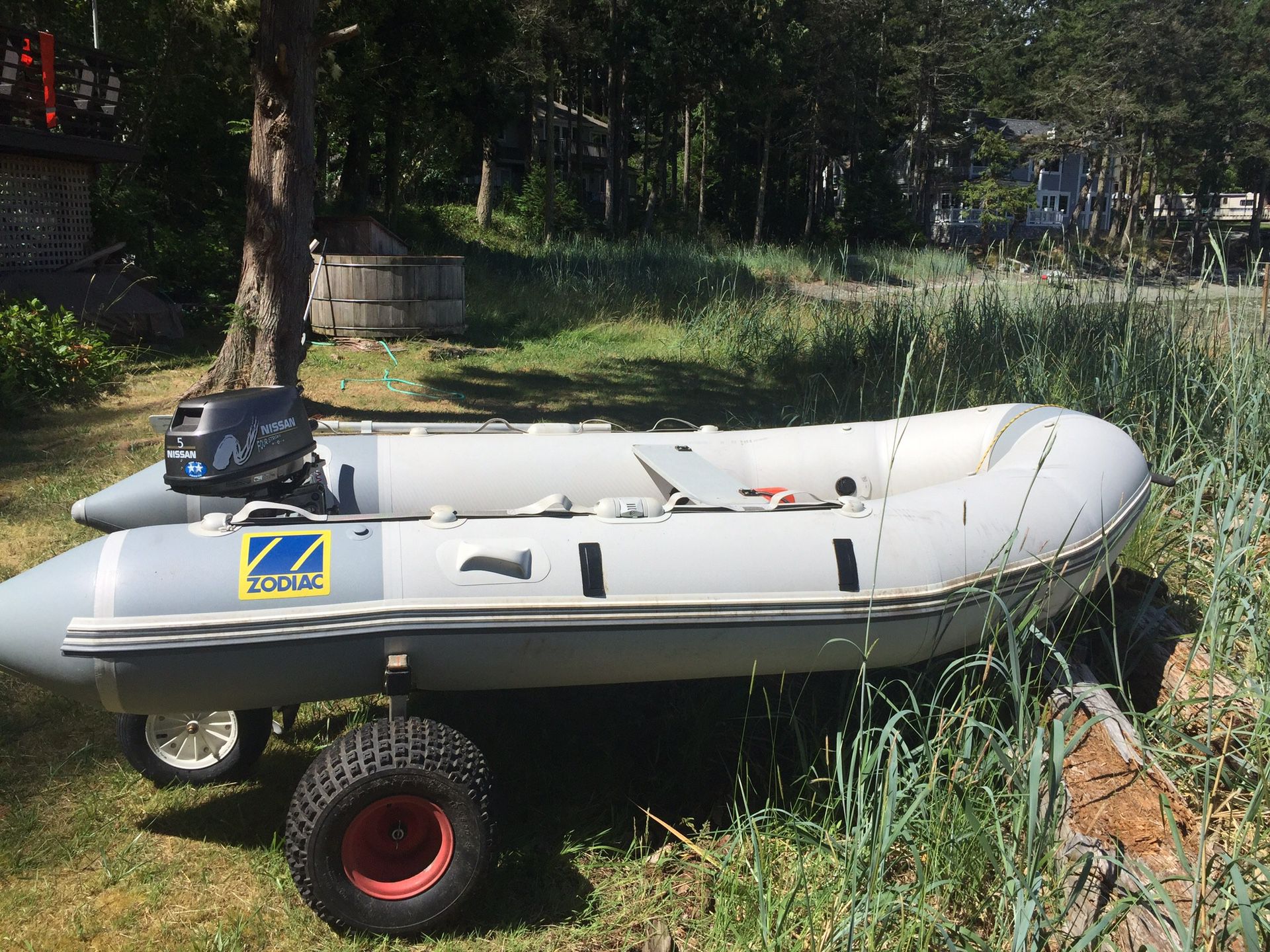 12’ Zodiac Inflatable with barely used 5hp 4-Stroke Nissan