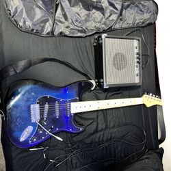 Strat Electric Guitar With Amp And Amp Cords 