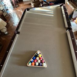 Pool table  55 inches wide and 98 inches long