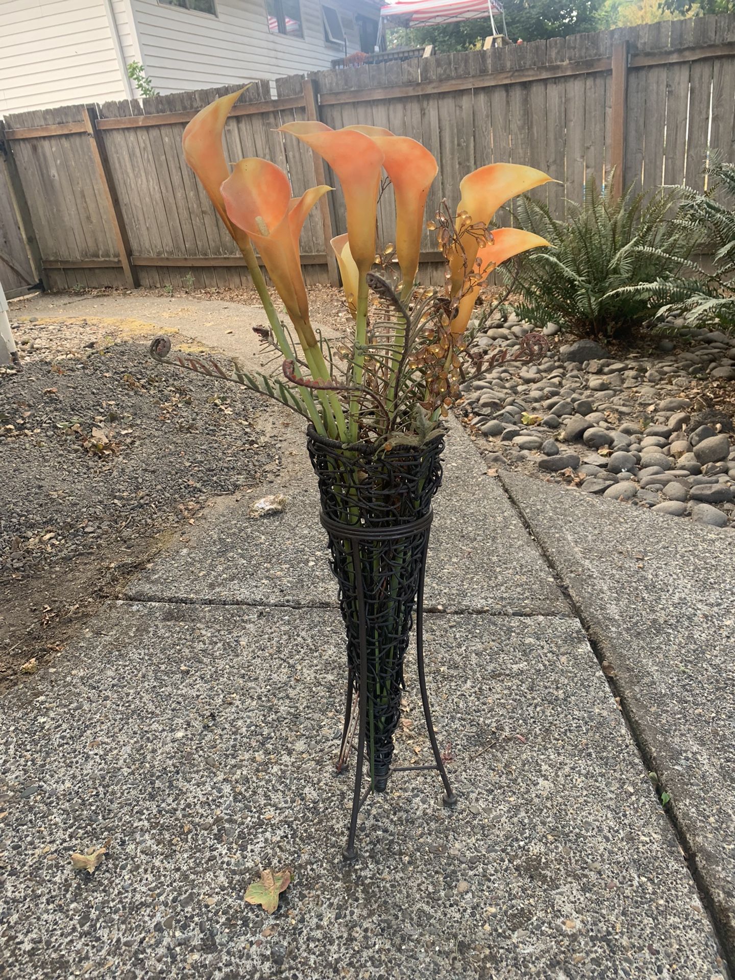 Orange Flowers And Wicker Vase