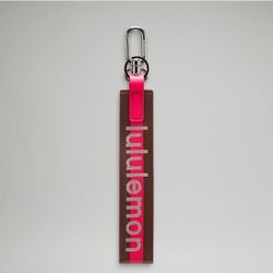 BRAND NEW Lululemon never lost keychain 