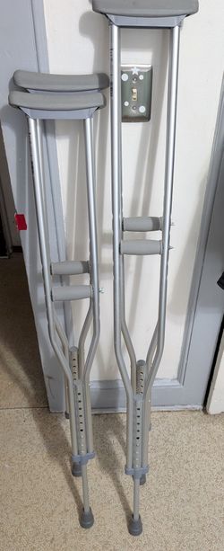 Two Pairs Of Crutches