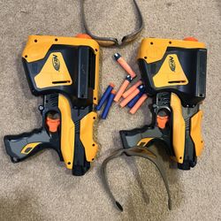 2 Nerf Guns With Glasses And Some Darts