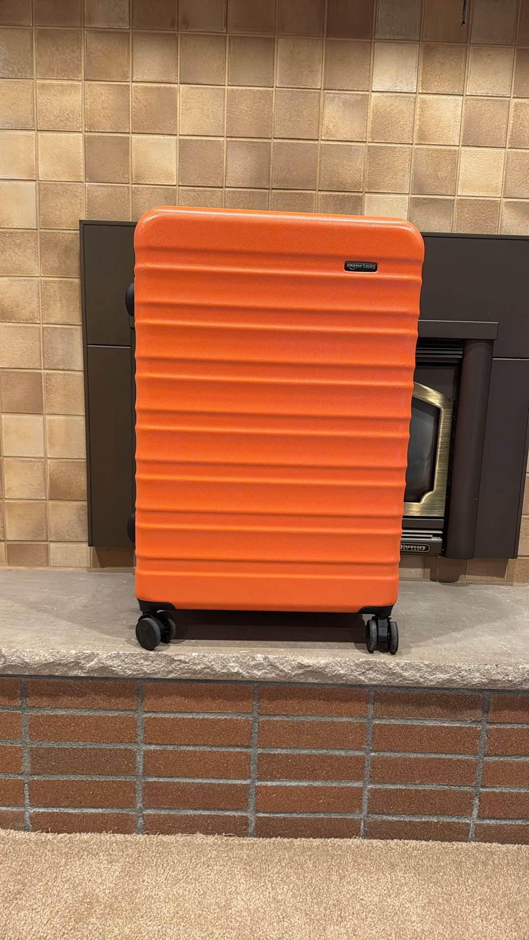 Amazon Basics large rollable suitcase