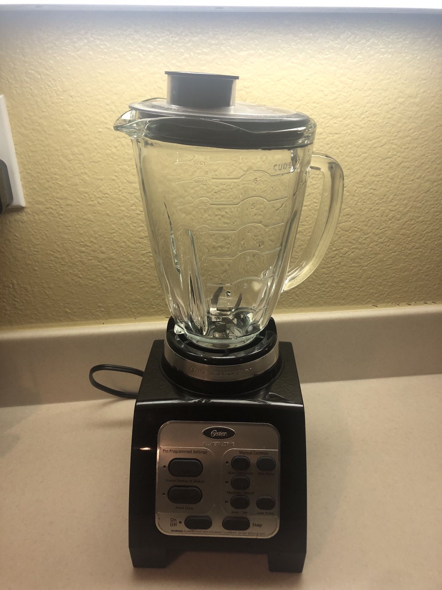 Oster Fusion blender with glass cup