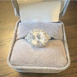 Sterling Silver Halo Ring with Cushion Cut Stone