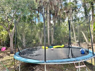 12-14ft trampoline one year-old