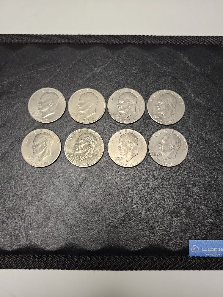 8- Liberty Eisenhower Dollar Coins