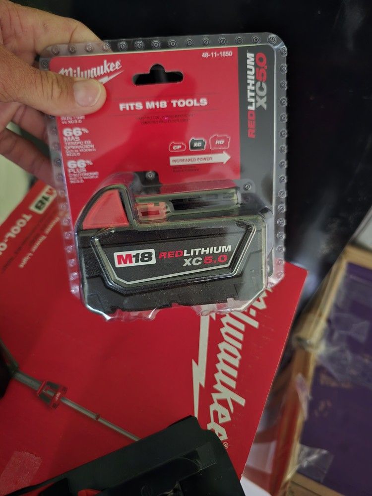 2 Milwaukee M18 5.0 Batteries 