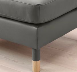 Grey leather Ikea Murbo ottoman with wooden legs