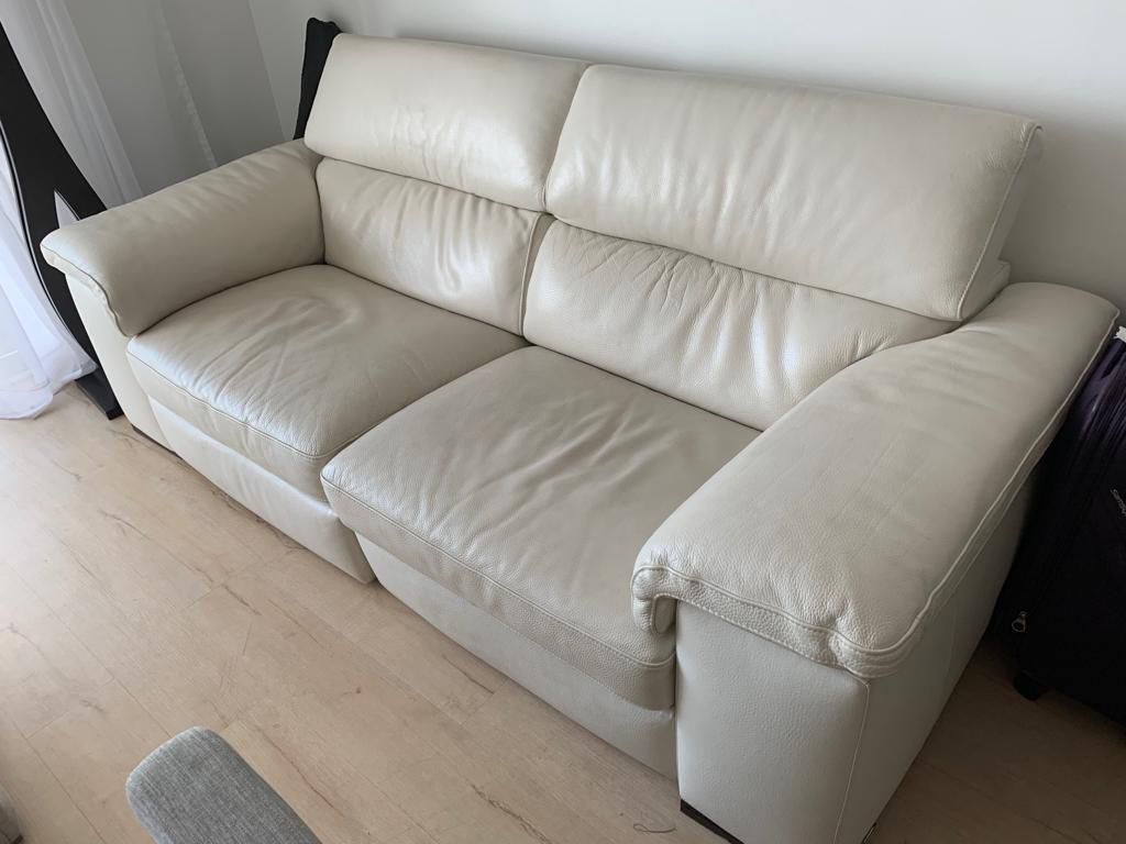 Natuzzi Edition Italian couch original price $2500. Real white leather.
